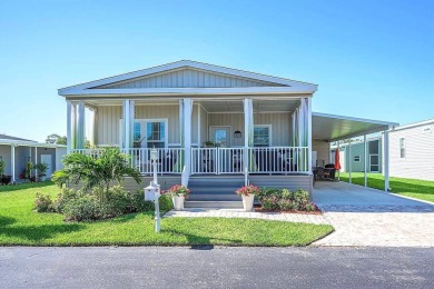 OUTSTANDING ONE OF A KIND NEWER HOME WITH HUGE & INVITING FRONT on Royal Wood Golf and Country Club in Florida - for sale on GolfHomes.com, golf home, golf lot