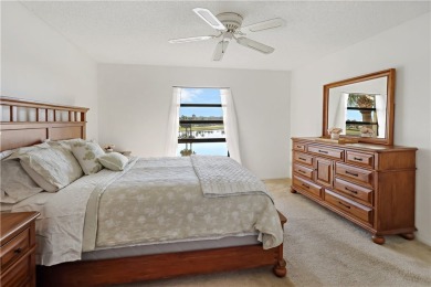 Enjoy resort-style living in this bright 2nd-floor corner unit on Vista Plantation Golf Club in Florida - for sale on GolfHomes.com, golf home, golf lot