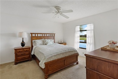 Enjoy resort-style living in this bright 2nd-floor corner unit on Vista Plantation Golf Club in Florida - for sale on GolfHomes.com, golf home, golf lot