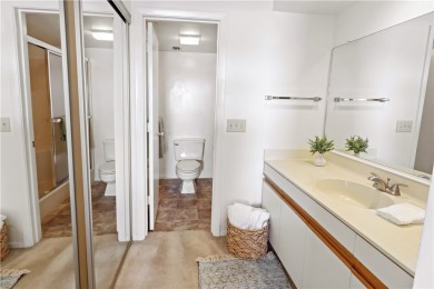 Enjoy resort-style living in this bright 2nd-floor corner unit on Vista Plantation Golf Club in Florida - for sale on GolfHomes.com, golf home, golf lot