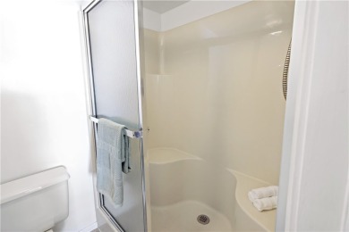 Enjoy resort-style living in this bright 2nd-floor corner unit on Vista Plantation Golf Club in Florida - for sale on GolfHomes.com, golf home, golf lot