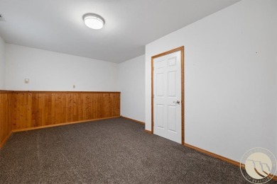 Welcome to this spacious and inviting 4 bed, 3 bath home filled on Lake Hills Golf Course in Montana - for sale on GolfHomes.com, golf home, golf lot