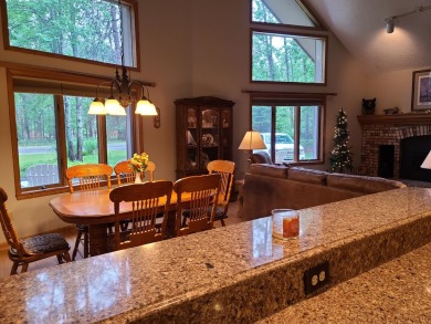 In Beautiful Michaywe find this well maintained 3BR 3BTH on Michaywe Pines Course in Michigan - for sale on GolfHomes.com, golf home, golf lot