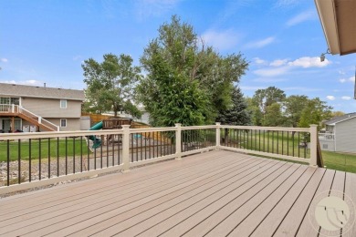Welcome to this spacious and inviting 4 bed, 3 bath home filled on Lake Hills Golf Course in Montana - for sale on GolfHomes.com, golf home, golf lot