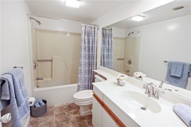 Enjoy resort-style living in this bright 2nd-floor corner unit on Vista Plantation Golf Club in Florida - for sale on GolfHomes.com, golf home, golf lot