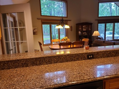 In Beautiful Michaywe find this well maintained 3BR 3BTH on Michaywe Pines Course in Michigan - for sale on GolfHomes.com, golf home, golf lot