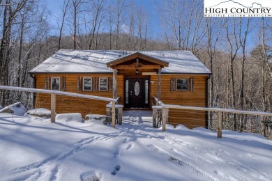 This charming Creekside cabin offers the perfect blend of on Beech Mountain Club in North Carolina - for sale on GolfHomes.com, golf home, golf lot