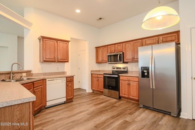 Ready for a fresh start living at the Carolina Coast? Situated on Meadowlands Golf Club in North Carolina - for sale on GolfHomes.com, golf home, golf lot