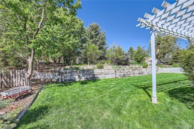 Nestled on a corner lot in a serene cul-de-sac within the on Red Hawk Ridge in Colorado - for sale on GolfHomes.com, golf home, golf lot