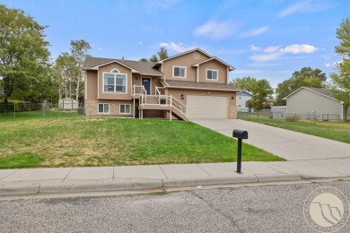 Welcome to this spacious and inviting 4 bed, 3 bath home filled on Lake Hills Golf Course in Montana - for sale on GolfHomes.com, golf home, golf lot
