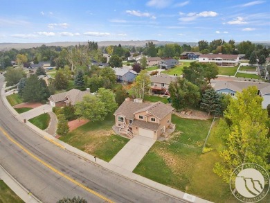 Welcome to this spacious and inviting 4 bed, 3 bath home filled on Lake Hills Golf Course in Montana - for sale on GolfHomes.com, golf home, golf lot