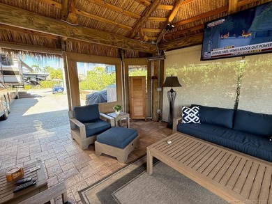A SPORT LOVER'S DREAM WITH PRIVACY AND COMFORT! Perfectly on St. Lucie Trail Golf Club in Florida - for sale on GolfHomes.com, golf home, golf lot