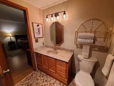 In Beautiful Michaywe find this well maintained 3BR 3BTH on Michaywe Pines Course in Michigan - for sale on GolfHomes.com, golf home, golf lot