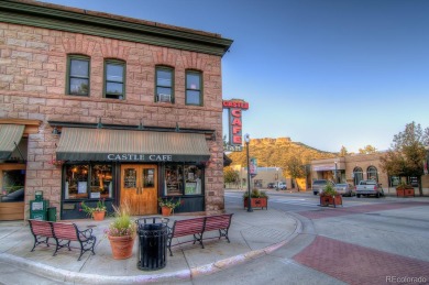 Nestled on a corner lot in a serene cul-de-sac within the on Red Hawk Ridge in Colorado - for sale on GolfHomes.com, golf home, golf lot