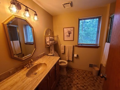 In Beautiful Michaywe find this well maintained 3BR 3BTH on Michaywe Pines Course in Michigan - for sale on GolfHomes.com, golf home, golf lot