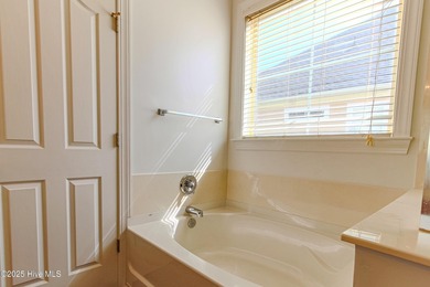 Ready for a fresh start living at the Carolina Coast? Situated on Meadowlands Golf Club in North Carolina - for sale on GolfHomes.com, golf home, golf lot