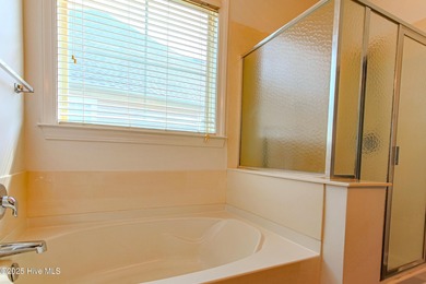 Ready for a fresh start living at the Carolina Coast? Situated on Meadowlands Golf Club in North Carolina - for sale on GolfHomes.com, golf home, golf lot