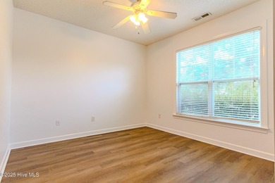 Ready for a fresh start living at the Carolina Coast? Situated on Meadowlands Golf Club in North Carolina - for sale on GolfHomes.com, golf home, golf lot