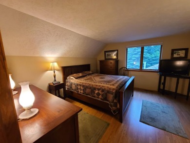 In Beautiful Michaywe find this well maintained 3BR 3BTH on Michaywe Pines Course in Michigan - for sale on GolfHomes.com, golf home, golf lot