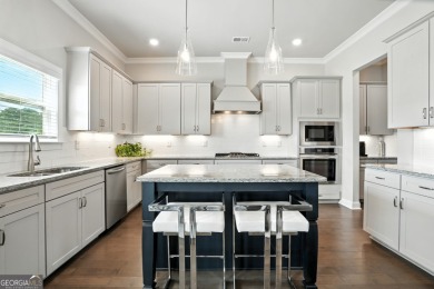 Welcome to this beautifully designed 5-bedroom, 4-bath home on Canongate At Heron Bay in Georgia - for sale on GolfHomes.com, golf home, golf lot