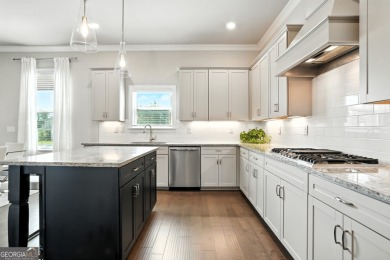 Welcome to this beautifully designed 5-bedroom, 4-bath home on Canongate At Heron Bay in Georgia - for sale on GolfHomes.com, golf home, golf lot