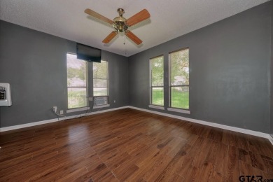 Step inside this charming single-story cottage and discover the on Hide-A-Way Lake Golf Course in Texas - for sale on GolfHomes.com, golf home, golf lot