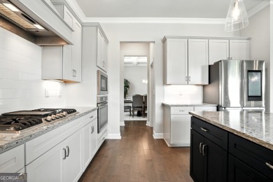 Welcome to this beautifully designed 5-bedroom, 4-bath home on Canongate At Heron Bay in Georgia - for sale on GolfHomes.com, golf home, golf lot