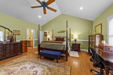 Situated on a corner lot and nestled on 1.29 wooded acres in the on The Neuse Golf Club in North Carolina - for sale on GolfHomes.com, golf home, golf lot