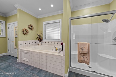 Situated on a corner lot and nestled on 1.29 wooded acres in the on The Neuse Golf Club in North Carolina - for sale on GolfHomes.com, golf home, golf lot