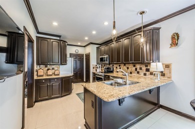 This beautifully remodeled 4-bedroom, 3-bathroom home offers on CrossWinds Golf Course in Kentucky - for sale on GolfHomes.com, golf home, golf lot