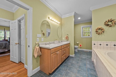 Situated on a corner lot and nestled on 1.29 wooded acres in the on The Neuse Golf Club in North Carolina - for sale on GolfHomes.com, golf home, golf lot