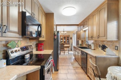 Updated, spacious and charming 1-1/2 story home located near on Patty Jewett Golf Course in Colorado - for sale on GolfHomes.com, golf home, golf lot
