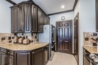 This beautifully remodeled 4-bedroom, 3-bathroom home offers on CrossWinds Golf Course in Kentucky - for sale on GolfHomes.com, golf home, golf lot