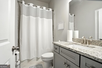 Welcome to this beautifully designed 5-bedroom, 4-bath home on Canongate At Heron Bay in Georgia - for sale on GolfHomes.com, golf home, golf lot