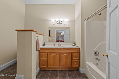 Situated on a corner lot and nestled on 1.29 wooded acres in the on The Neuse Golf Club in North Carolina - for sale on GolfHomes.com, golf home, golf lot