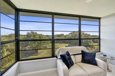 Move-in ready top-floor 2-bedroom, 2-bath condo with no on Pine Island Ridge Country Club in Florida - for sale on GolfHomes.com, golf home, golf lot