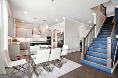 Welcome to this beautifully designed 5-bedroom, 4-bath home on Canongate At Heron Bay in Georgia - for sale on GolfHomes.com, golf home, golf lot