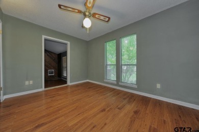 Step inside this charming single-story cottage and discover the on Hide-A-Way Lake Golf Course in Texas - for sale on GolfHomes.com, golf home, golf lot