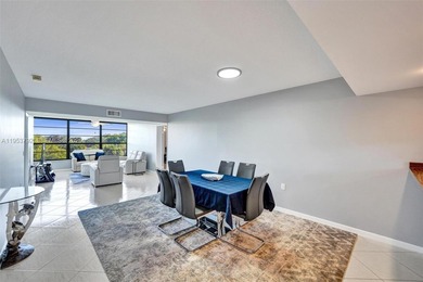 Move-in ready top-floor 2-bedroom, 2-bath condo with no on Pine Island Ridge Country Club in Florida - for sale on GolfHomes.com, golf home, golf lot