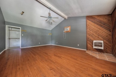 Step inside this charming single-story cottage and discover the on Hide-A-Way Lake Golf Course in Texas - for sale on GolfHomes.com, golf home, golf lot