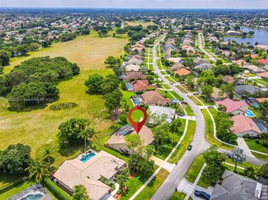 A desirable equestrian community in Greenview Shores. One-story on Greenview Cove Golf Club in Florida - for sale on GolfHomes.com, golf home, golf lot
