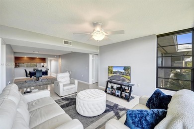 Move-in ready top-floor 2-bedroom, 2-bath condo with no on Pine Island Ridge Country Club in Florida - for sale on GolfHomes.com, golf home, golf lot