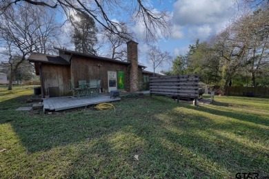 Step inside this charming single-story cottage and discover the on Hide-A-Way Lake Golf Course in Texas - for sale on GolfHomes.com, golf home, golf lot