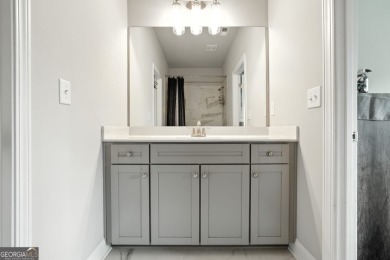 Welcome to this beautifully designed 5-bedroom, 4-bath home on Canongate At Heron Bay in Georgia - for sale on GolfHomes.com, golf home, golf lot