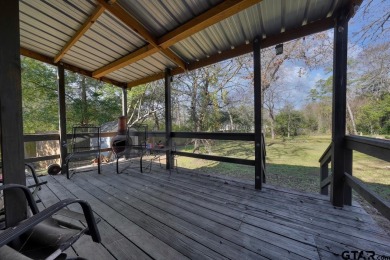 Step inside this charming single-story cottage and discover the on Hide-A-Way Lake Golf Course in Texas - for sale on GolfHomes.com, golf home, golf lot