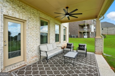 Welcome to this beautifully designed 5-bedroom, 4-bath home on Canongate At Heron Bay in Georgia - for sale on GolfHomes.com, golf home, golf lot