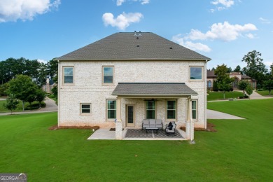 Welcome to this beautifully designed 5-bedroom, 4-bath home on Canongate At Heron Bay in Georgia - for sale on GolfHomes.com, golf home, golf lot