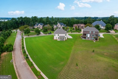 Welcome to this beautifully designed 5-bedroom, 4-bath home on Canongate At Heron Bay in Georgia - for sale on GolfHomes.com, golf home, golf lot