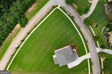 Welcome to this beautifully designed 5-bedroom, 4-bath home on Canongate At Heron Bay in Georgia - for sale on GolfHomes.com, golf home, golf lot