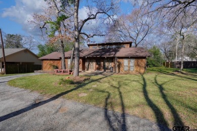 Step inside this charming single-story cottage and discover the on Hide-A-Way Lake Golf Course in Texas - for sale on GolfHomes.com, golf home, golf lot